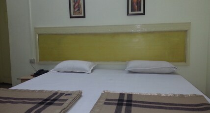 Raj Kumbh Guest House Room Type - Budget Double ( Shared Washroom)