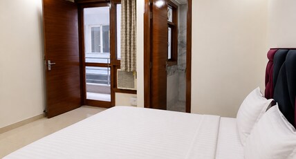 Jasmine Stays | Premium 2 BHK Escape | SEC 57 Room Type - Bedroom 2