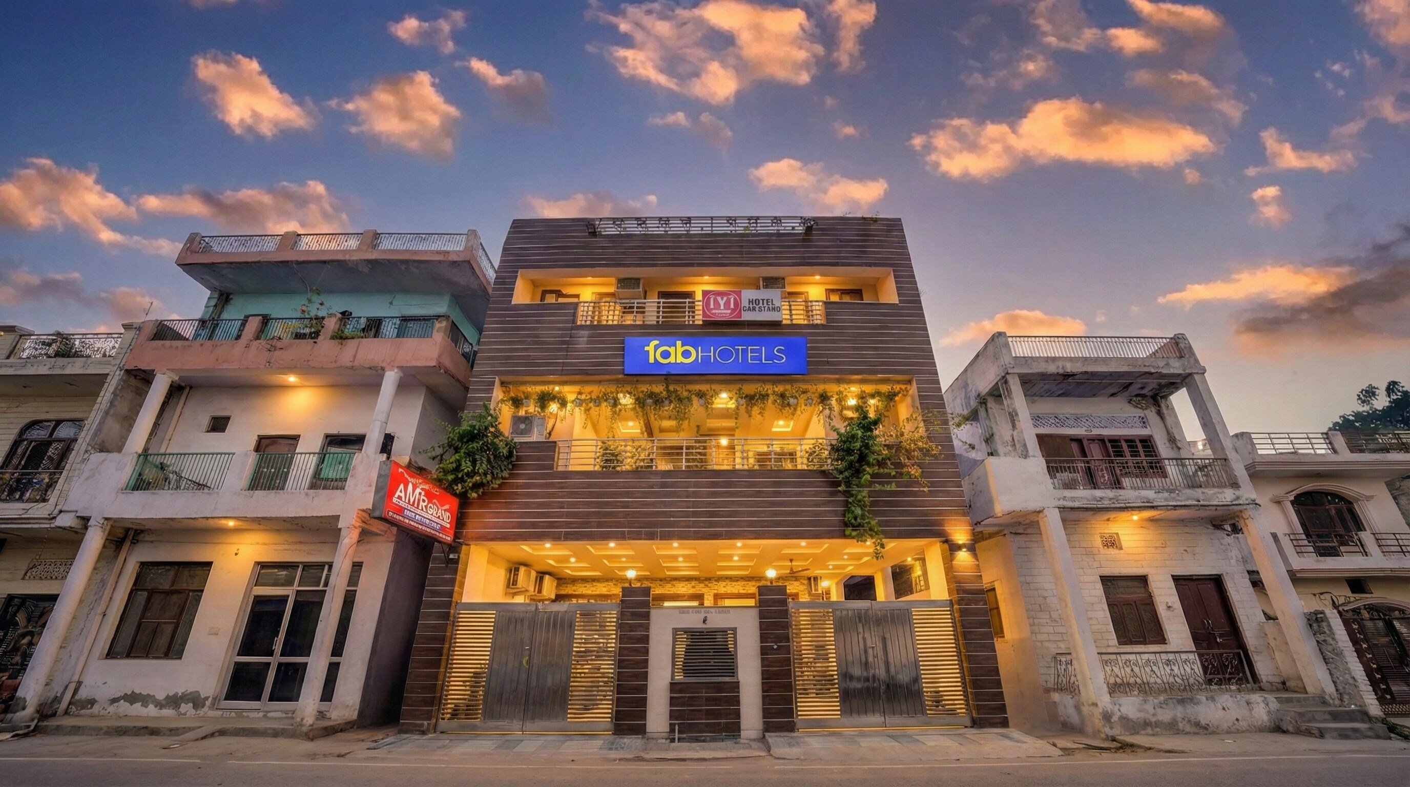 FabHotel AMR Grand - Tap to explore photos