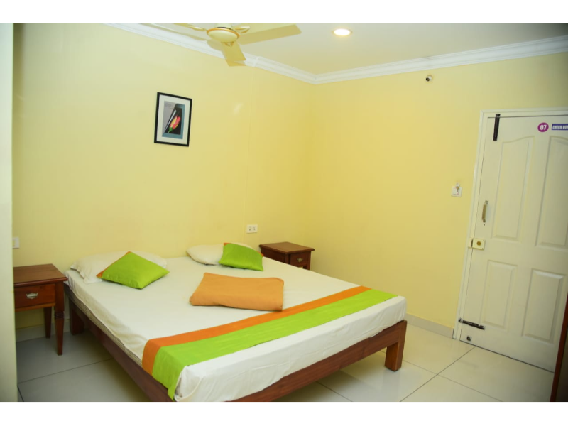 Coorg Inn Rooms - Tap to explore photos