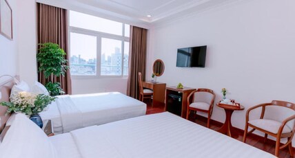 Dahlialand Saigon Hotel Room Type - Triple Room With City View