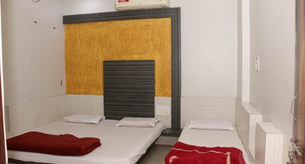 Hotel Shri Radhekrishna,Omkareshwar Room Type - Triple Bedded NON AC