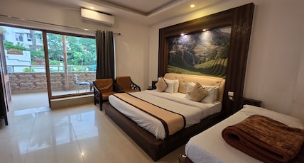 Hotel Rajpur Heights Room Type - Super Deluxe Triple Garden View Hotel Rajpur Heights Room Type - Super Deluxe Triple Garden View