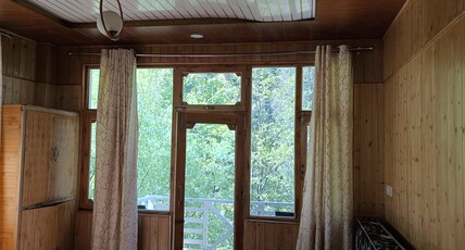 Nature,s Vault jibhi Room Type - Bedroom 101