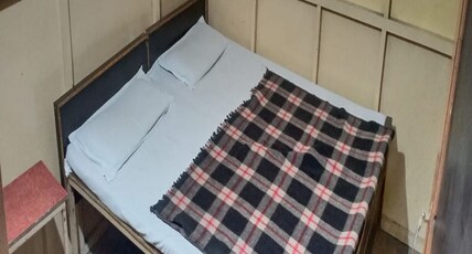 Hotel MJ Room Type - Non - AC Room (Shared Washroom)