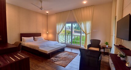 The TreeTop Escape by VOYE HOMES Room Type - Deluxe Garden View Room with Balcony