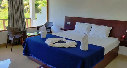 Hotel Exotica Squares Room Type - Deluxe AC Room