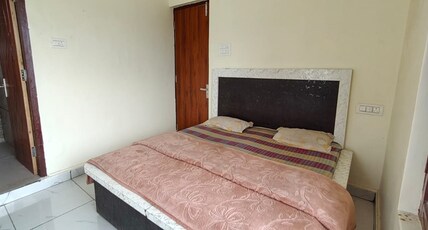 Nishant Guest House Room Type - Deluxe Double Bed with City View