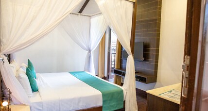 SinQ Beach Morjim. Room Type - Tropical Beach Cottage-Non sea view Balcony