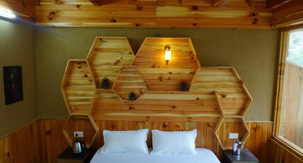 tirthajal kuteer Room Type - SUPER DELUXE FAMILY SUITE WITH BREATHTAKING RIVER  VIEWS