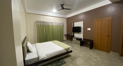 Hongthor Resort, Kaziranga Room Type - Deluxe Room (Balcony with Mountain View) Hongthor Resort, Kaziranga Room Type - Deluxe Room (Balcony with Mountain View)