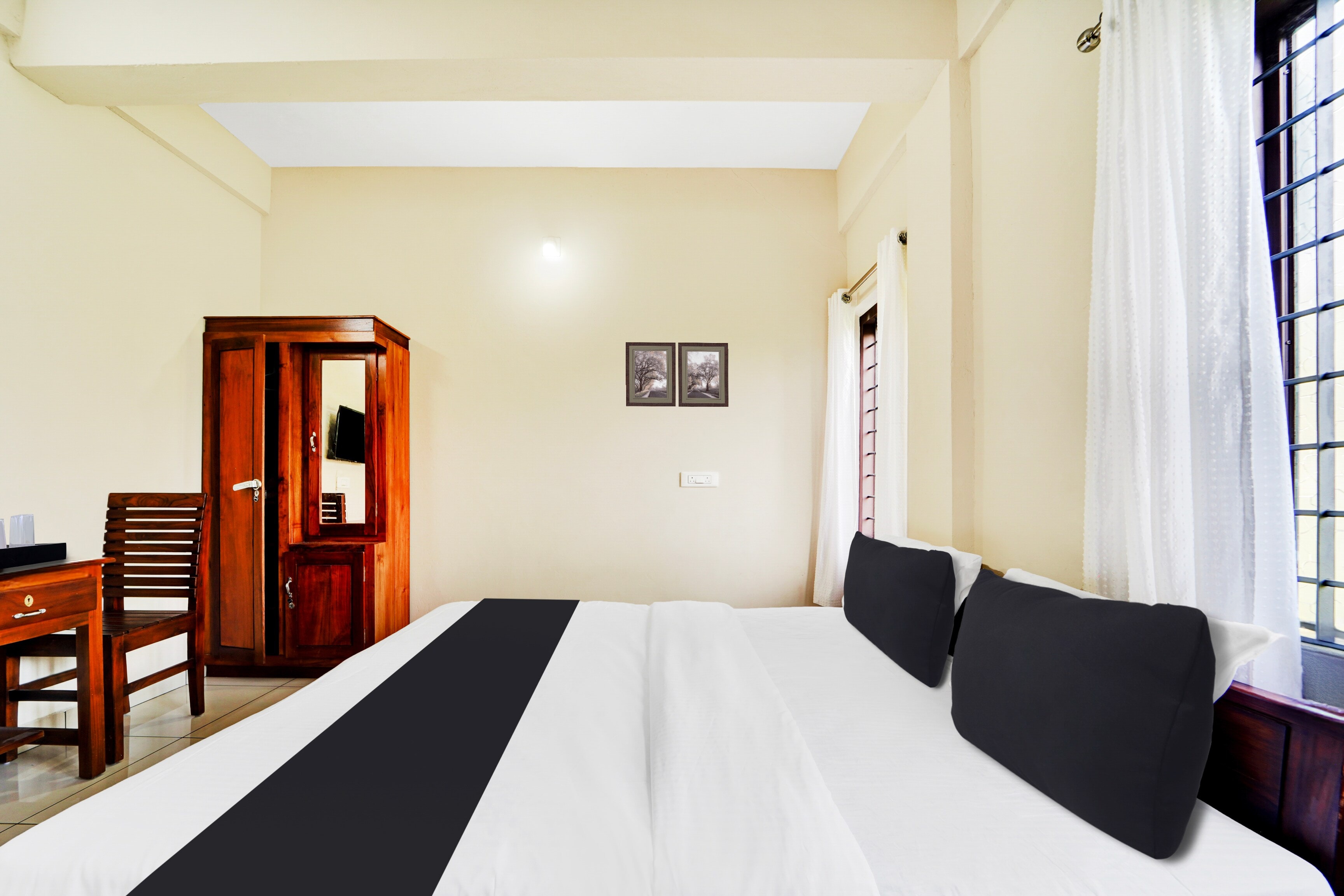 Hotel O Ambalamedu Puthenkurish Road - Tap to explore photos