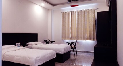 Pushpanjali Home Stay | Wi-Fi & Parking Room Type - Deluxe Double or Twin Room