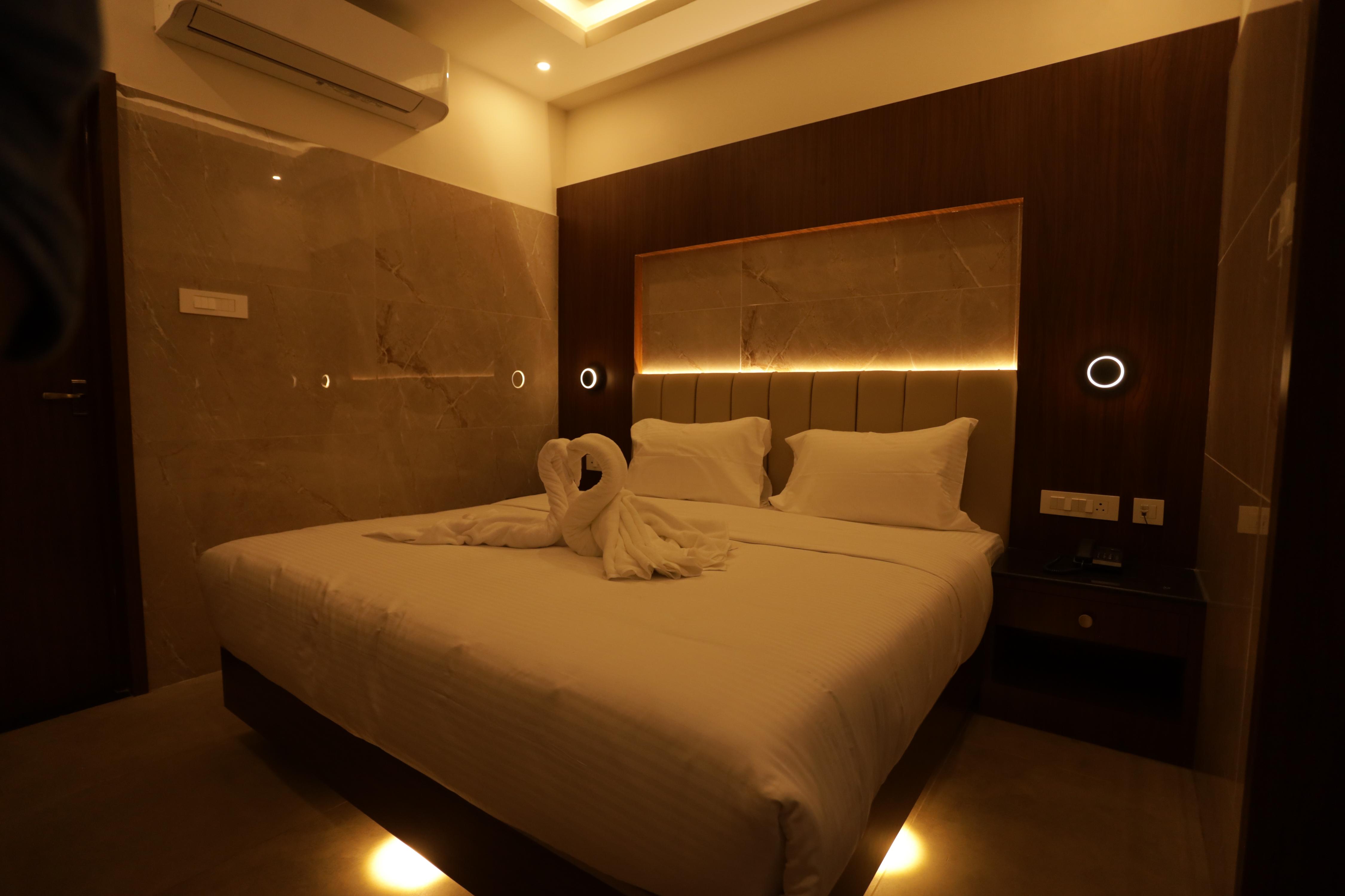 Arthana Residency Hotel - Tap to explore photos