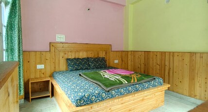 ADITYA GUEST HOUSE Room Type - Deluxe King Bed with River View