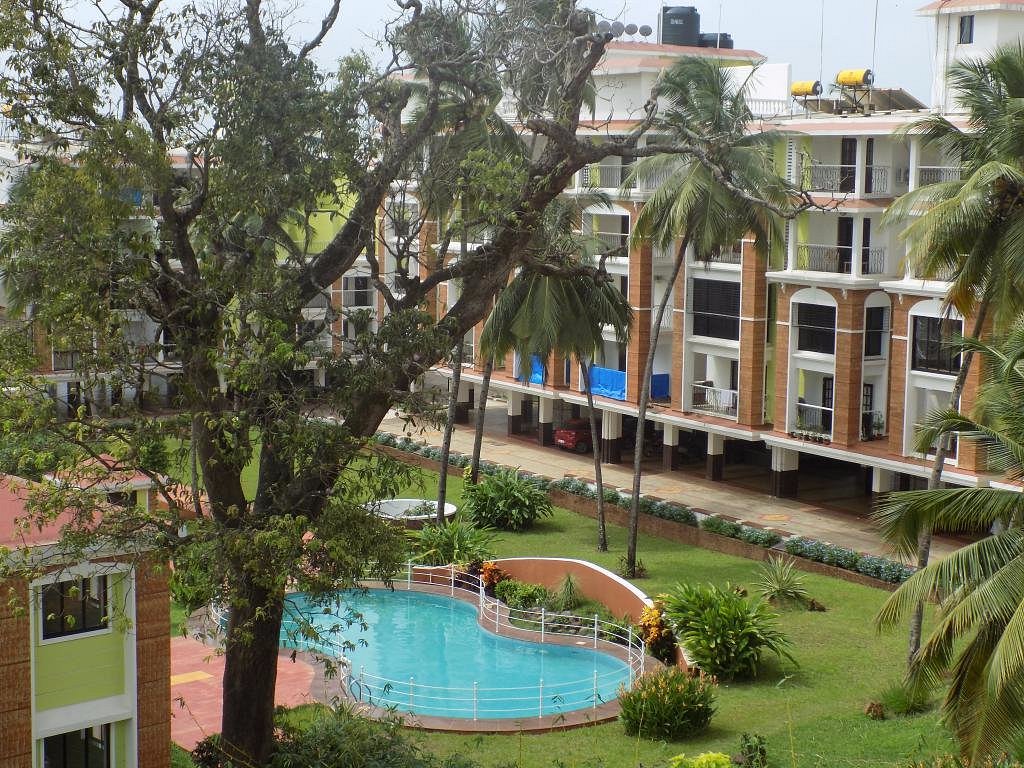 Sun n Sand | 2 BHK Pool Service Apartment - Tap to explore photos