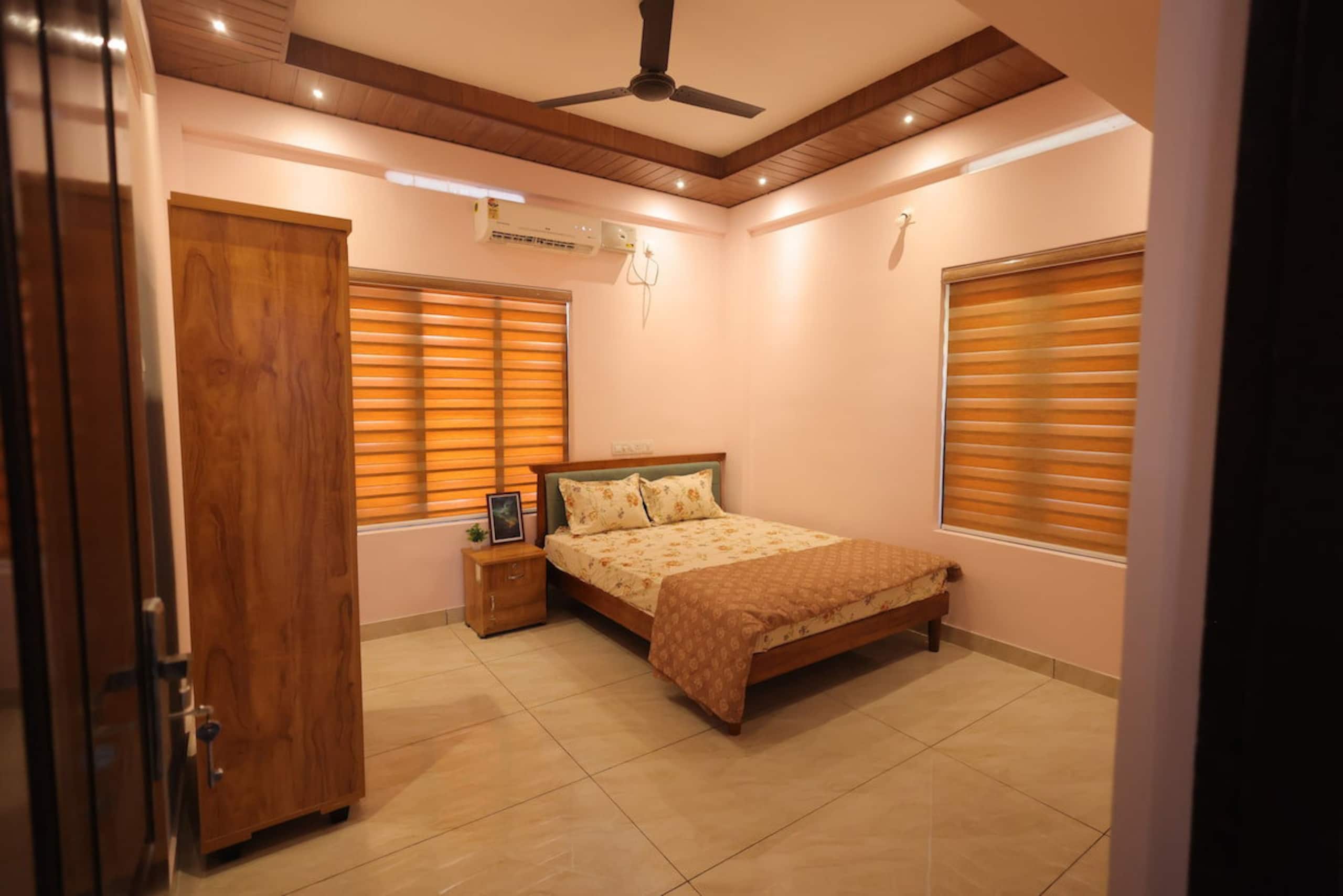 Green suites 2BHK Happifistays kazhakootam - Tap to explore photos