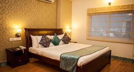 Orchid Suites Room Type - Deluxe Queen Room