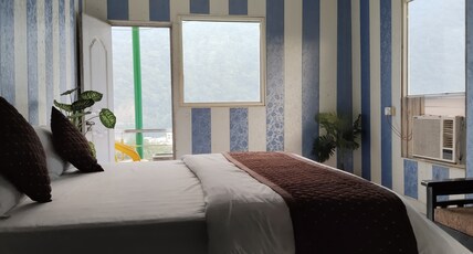 Hotel Nirvana By GuestLo Room Type - Deluxe Double Room