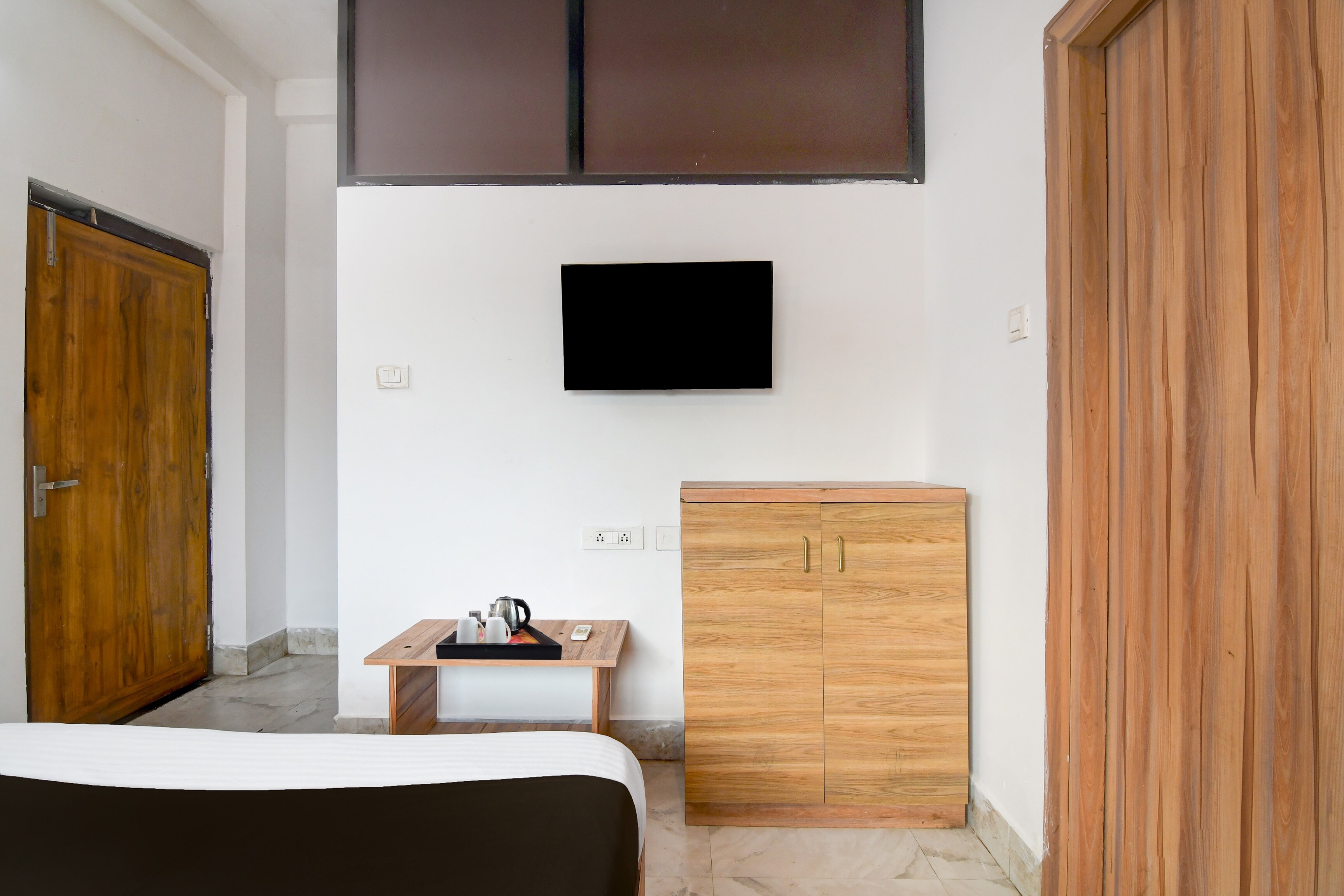 Super Hotel O Cosmopolis Bhubaneswar Formerly Luxury Stay - Tap to explore photos