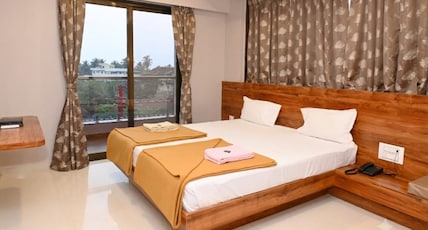Hotel Aaradhya Crown Room Type - DOUBLE BED NON AC Hotel Aaradhya Crown Room Type - DOUBLE BED NON AC