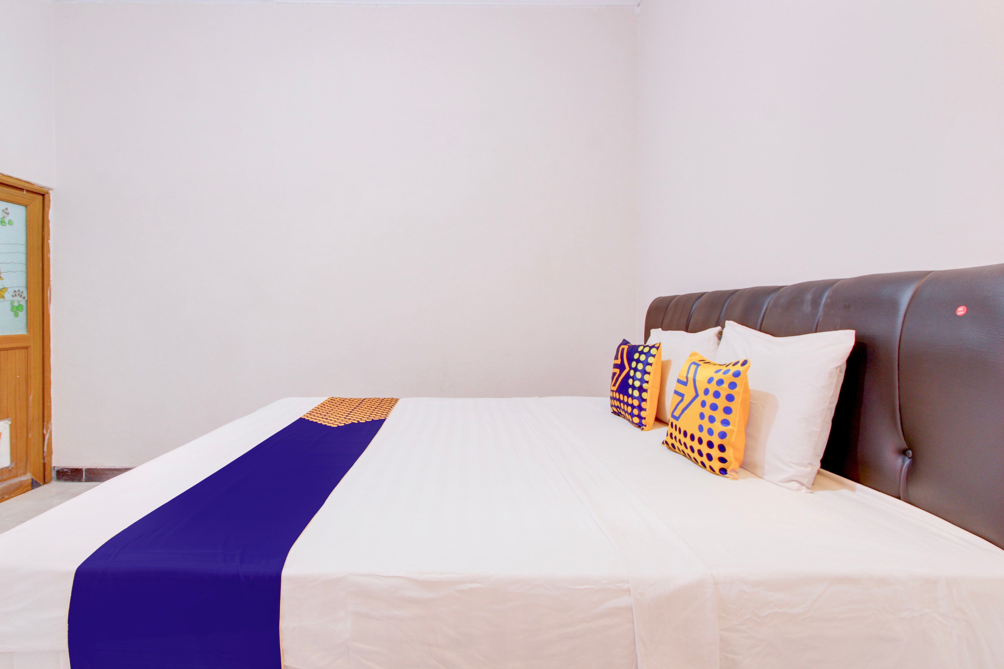 SPOT ON Podomoro Homestay - Tap to explore photos