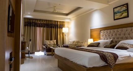 Hotel Lotus Paradise By Golden Key At Parker Mall Near TDI Kundli Room Type - Executive Pool View - Suite | Modern Luxury & Comfort Hotel Lotus Paradise By Golden Key At Parker Mall Near TDI Kundli Room Type - Executive Pool View - Suite | Modern Luxury & Comfort