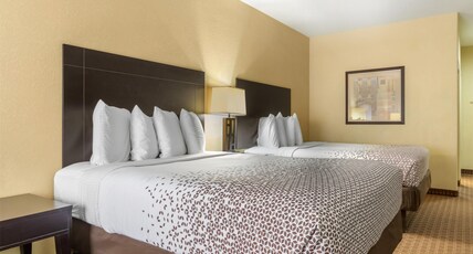 BEST WESTERN BASTROP PINES INN Room Type - 2 Queen Beds, Non-Smoking, Microwave And Refrigerator, Wi-Fi, Full Breakfast BEST WESTERN BASTROP PINES INN Room Type - 2 Queen Beds, Non-Smoking, Microwave And Refrigerator, Wi-Fi, Full Breakfast