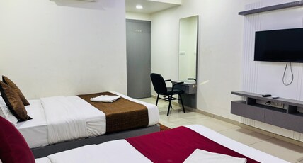 HOTEL MILLENNIUM ROOMS Room Type - Four Bed AC Room