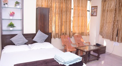 HOTEL LAKSH  LODGEING & BORDING Room Type - Deluxe Room