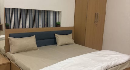 Harshan Homestay Inn   in Ranjit Avenue Room Type - Bedroom 1