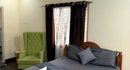 Namma Mysore Stays. Room Type - Deluxe King Room