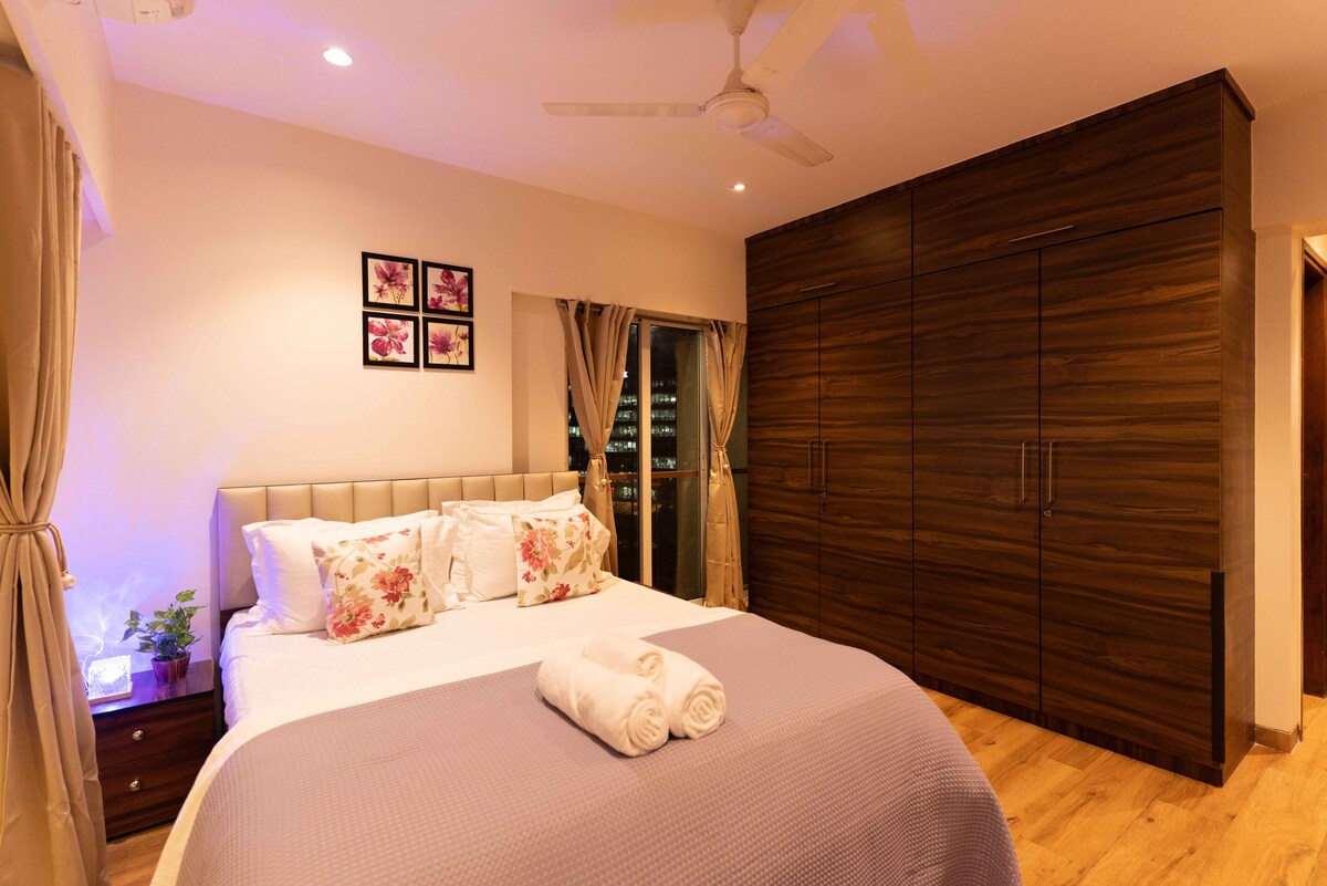 Elite 3BHK with Balcony Runway Views Near BKC by Iconic Stays - Tap to explore photos