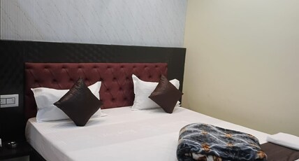 LEO PREMIUM ( Beach property) - A unit of Hotel Leo Castle Room Type - Deluxe triple bed room with sea view