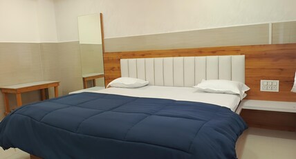 Hotel Ganpati and Lodging Room Type - Master Bed AC Delux Room