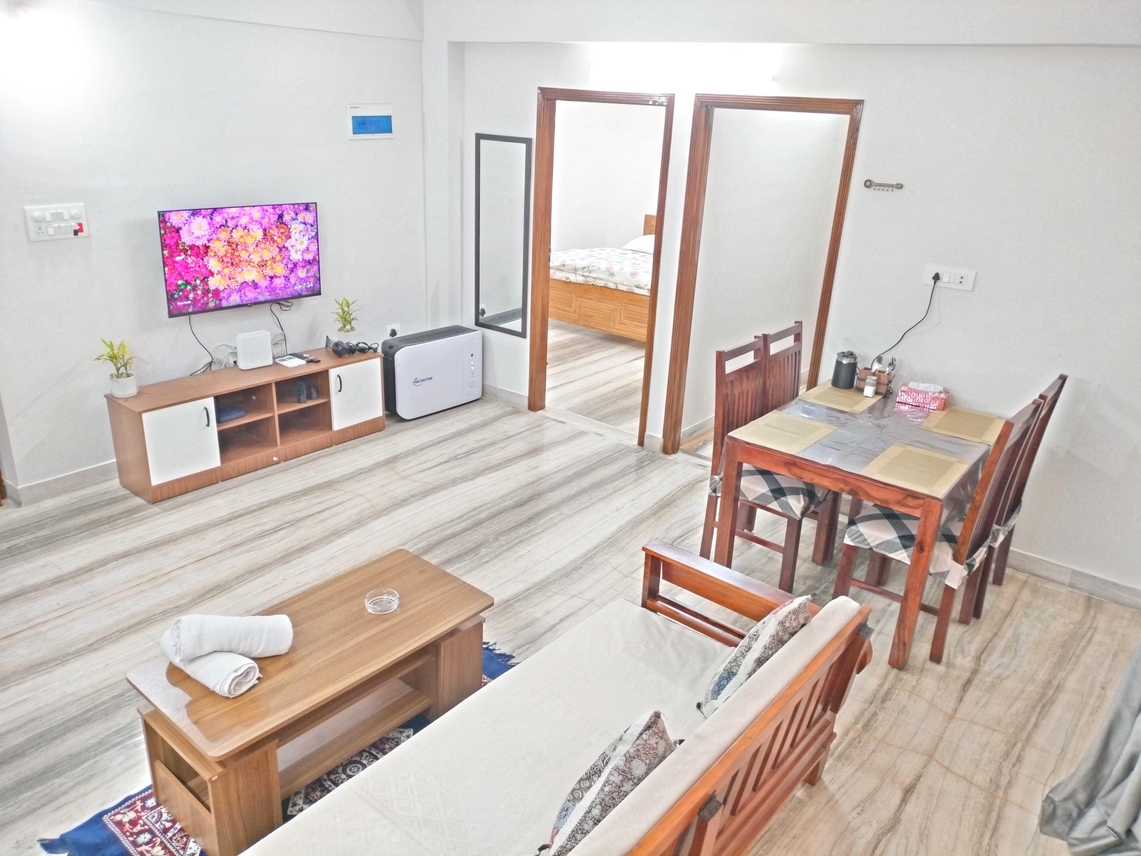 Modern 2BHK AC WiFi Parking | Nirmal Heights 102 - Tap to explore photos