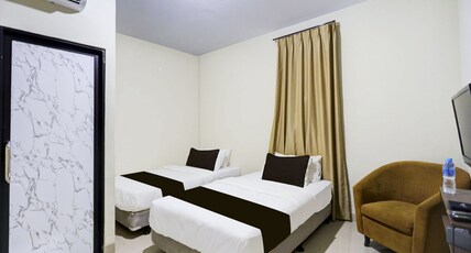 Collection O Near UNRIKA Formerly Dory Inn Room Type - Indonesia Deluxe Twin