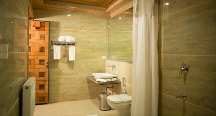 Hotel The Rosewood (Near Gulmarg Gondola) Room Type - Junior Deluxe Room (Valley View) - Centrally Heated Hotel The Rosewood (Near Gulmarg Gondola) Room Type - Junior Deluxe Room (Valley View) - Centrally Heated