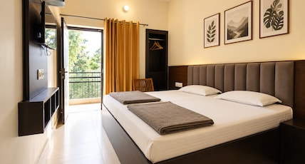 Hotel Moksha (500m From Ram Jhula) Room Type - Deluxe With Balcony Hotel Moksha (500m From Ram Jhula) Room Type - Deluxe With Balcony