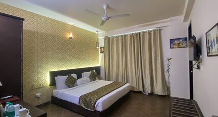 Woodapple Residency Room Type - Deluxe Room with Smart TV