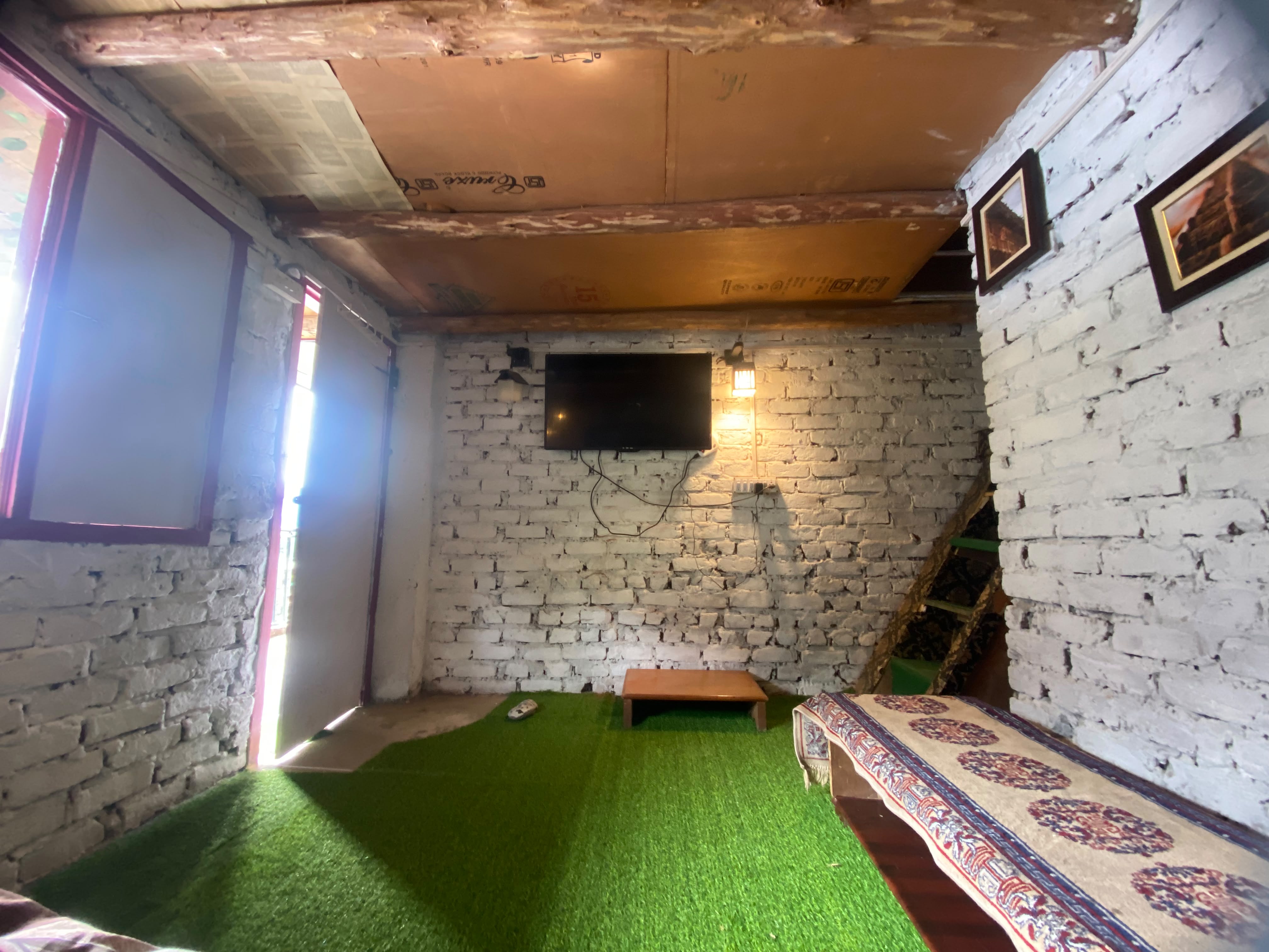 Macha's Nest - A Cozy Loft with Himalayan Views - Tap to explore photos