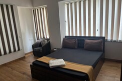 Cozy 1 Bhk by Royal Luxor