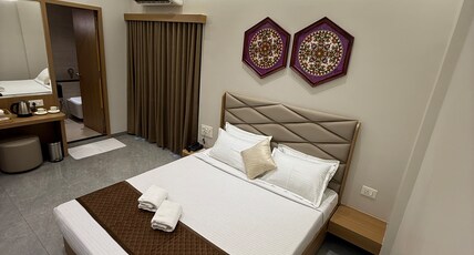TEJASVI BANQUETS Room Type - Super Deluxe Room