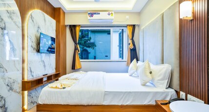 THE ROYAL NEST INN Room Type - Deluxe Room with City View
