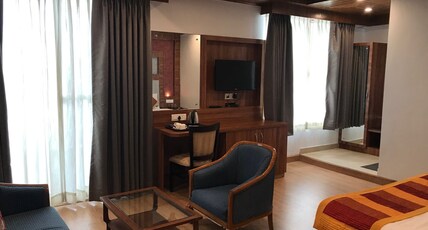 Krishna Orchard Resort Room Type - Premium Room with Balcony