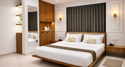 Raw Leaves  Premium Family & Business Hotel Near Rajkot Railway Station Room Type - LUXI SUITE