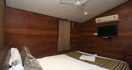 Hotel Rushabh Home near US Consulate Room Type - Deluxe Cottage