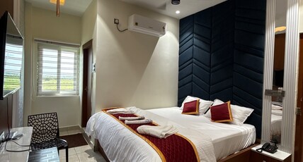 Hotel Snr Grand Room Type - STANDARD ROOM WITH GARDEN VIEW