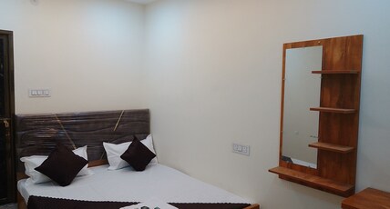 OM BED & Breakfast Guest House in varanasi Room Type - Superb Deluxe Room= 104( TV+ AC+ Attached washroom)