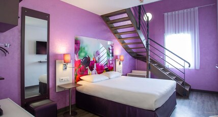 ibis Styles Bourges Room Type - Standard Family Suite with a double bed and twin beds
